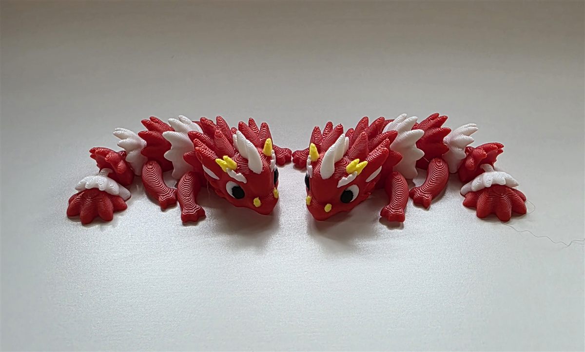 Ohybné 3D tlačené flexi figúrky – červené dráčiky